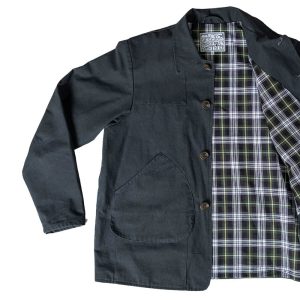 The gunpowder HebTroCo Jacksnipe Overjacket with a tartan lining